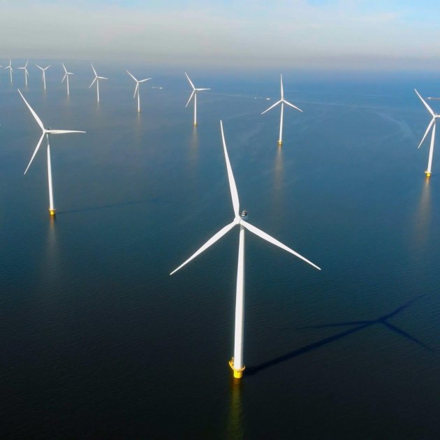 Drone view at windmill turbines at sea generating green energy in the netherlands w SBV 348461146 4 K mp4 00 00 04 18 Still002